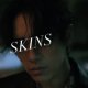 Okładka piosenki „SKINS”